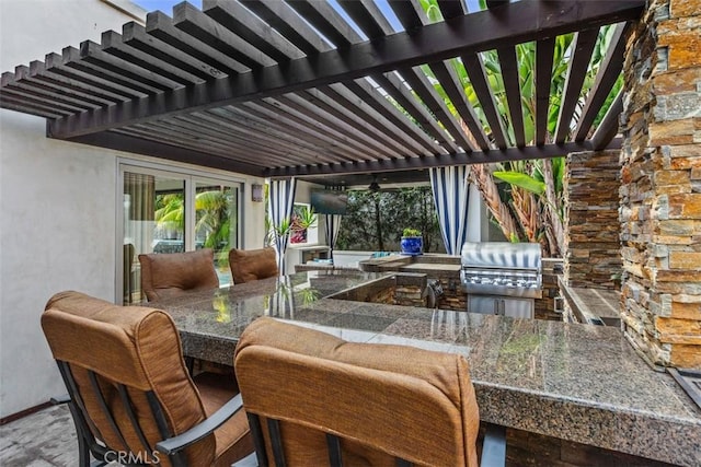 view of patio with outdoor dining space, grilling area, exterior kitchen, and a pergola