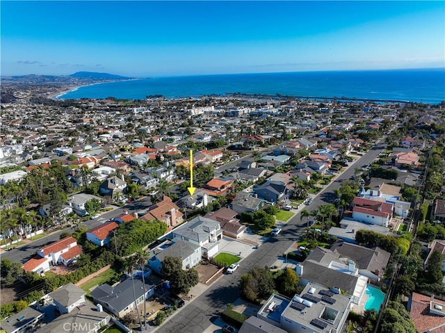 birds eye view of property featuring a water view and a residential view