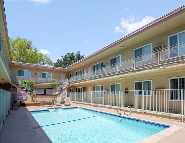 view of pool with a patio area