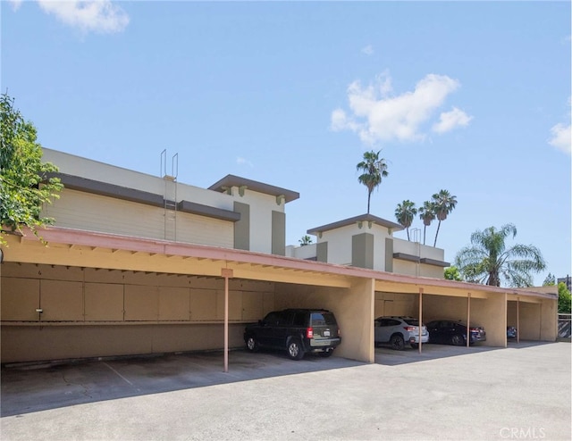 view of parking featuring a carport