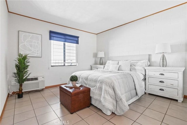 bedroom featuring light tile patterned flooring and crown molding