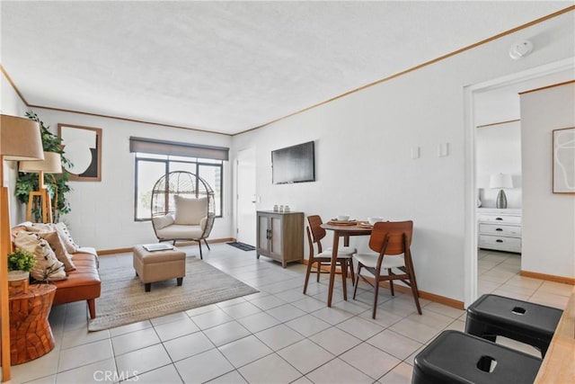 living room featuring crown molding and light tile patterned flooring