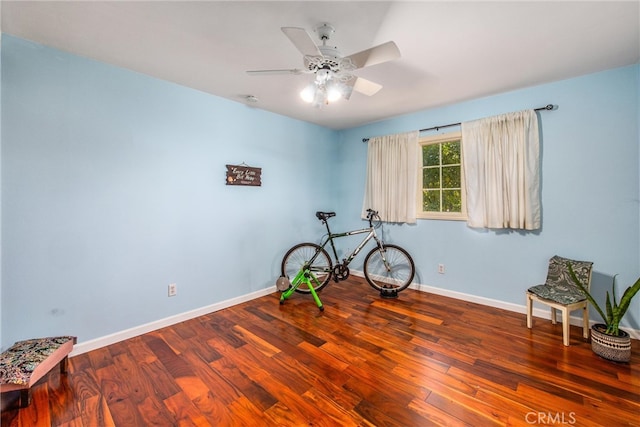 interior space featuring ceiling fan and hardwood / wood-style flooring