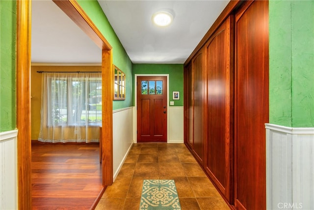 doorway with dark hardwood / wood-style flooring