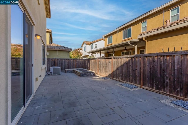 view of patio with central AC unit