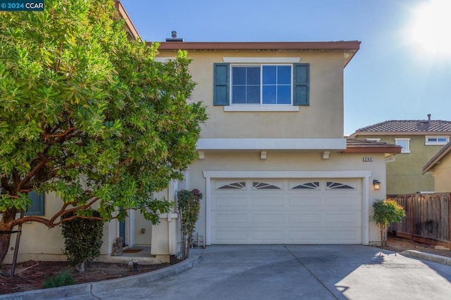 view of front of home with a garage