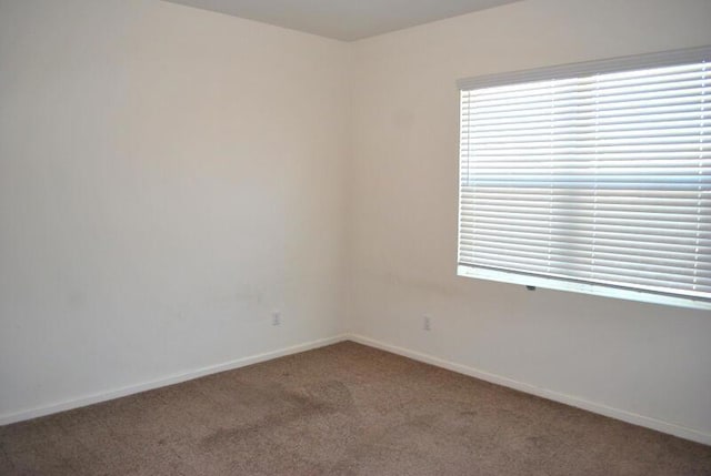 empty room with carpet floors