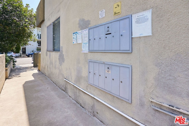 view of home's exterior featuring a mail area