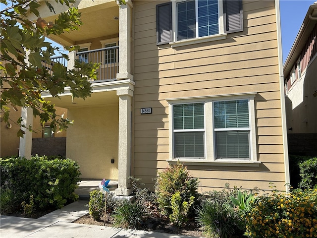 exterior space featuring a balcony