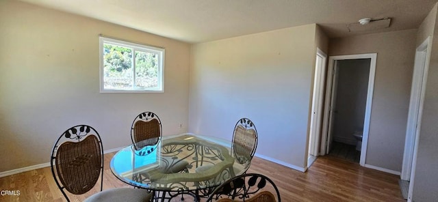 dining area featuring hardwood / wood-style floors