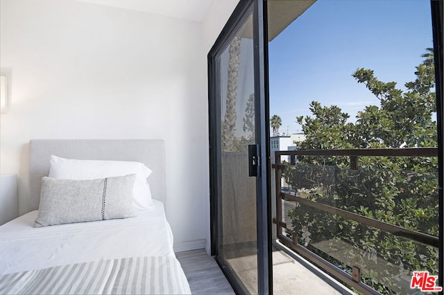 bedroom featuring hardwood / wood-style flooring