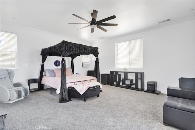 bedroom with crown molding, ceiling fan, cooling unit, and carpet