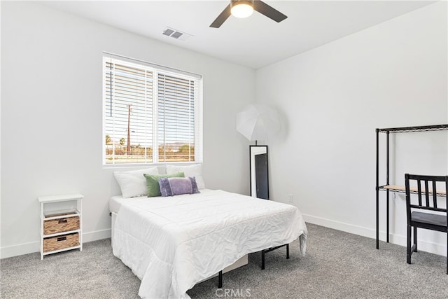 bedroom featuring light carpet and ceiling fan