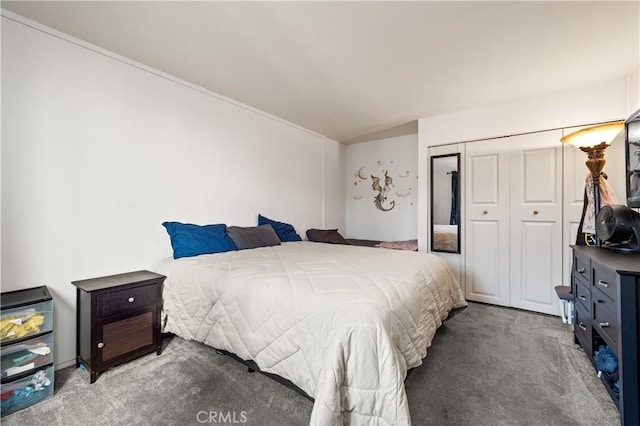 carpeted bedroom with a closet