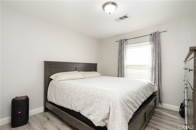 bedroom featuring light hardwood / wood-style floors