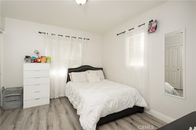 bedroom featuring light hardwood / wood-style floors