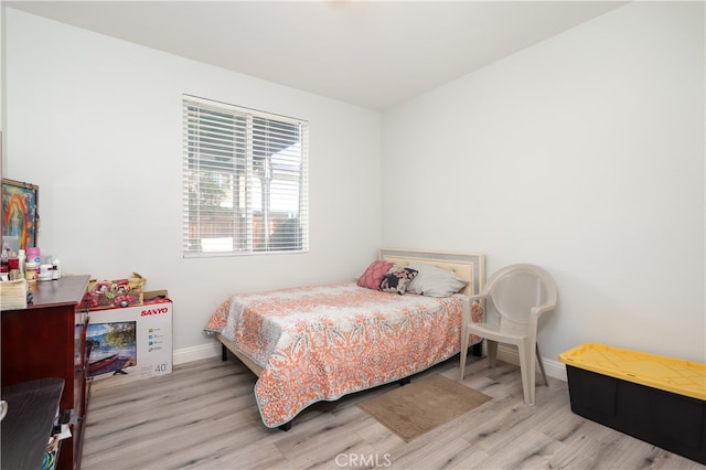 bedroom featuring light hardwood / wood-style floors