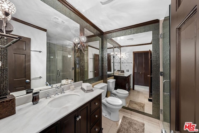 bathroom with vanity, tile patterned flooring, toilet, and an enclosed shower