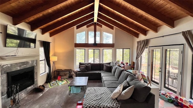 living area with wood ceiling, a fireplace, high vaulted ceiling, and beamed ceiling