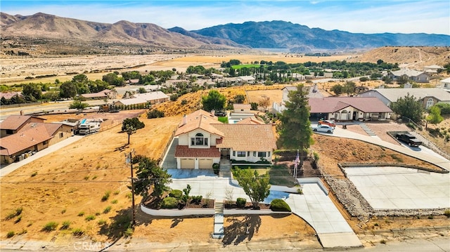 drone / aerial view featuring a mountain view