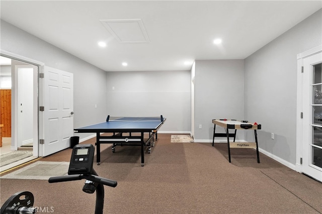 recreation room with carpet flooring