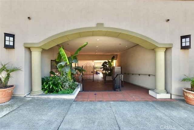 doorway to property with stucco siding