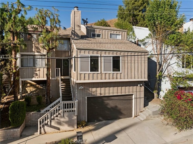 view of front of property featuring a garage