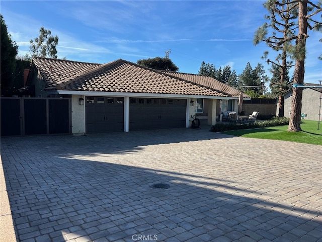 view of side of property featuring a garage