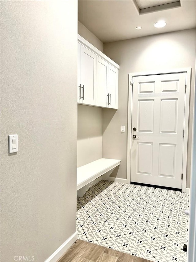 mudroom with light hardwood / wood-style flooring