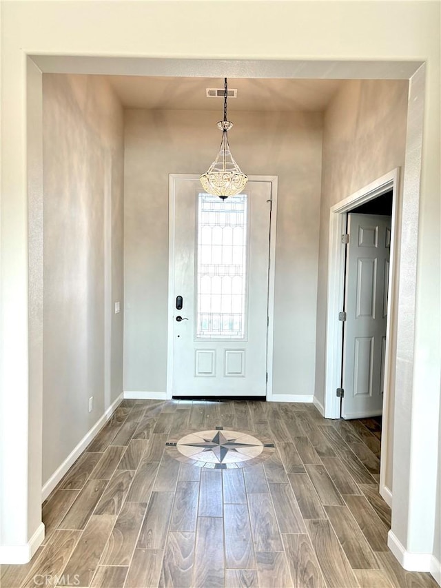 entrance foyer featuring hardwood / wood-style floors