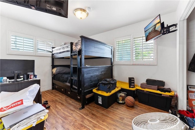 bedroom featuring hardwood / wood-style floors