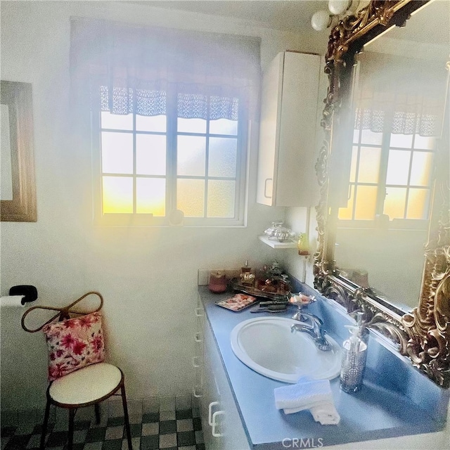 bathroom featuring vanity and plenty of natural light