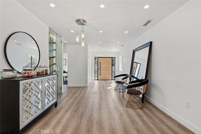 hall featuring light hardwood / wood-style floors