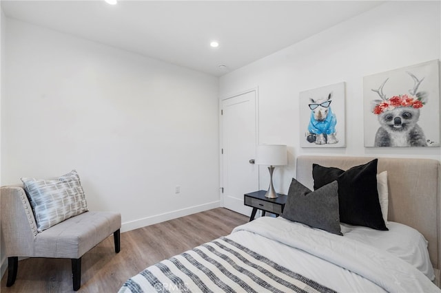 bedroom featuring light hardwood / wood-style floors