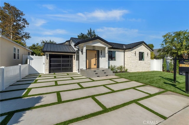 view of front of home with a front yard