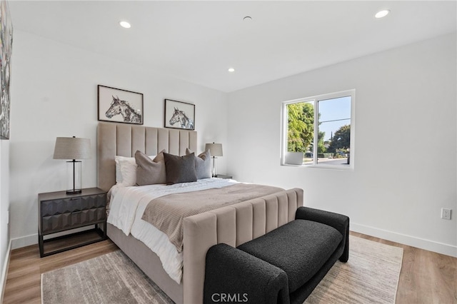 bedroom with light wood-type flooring