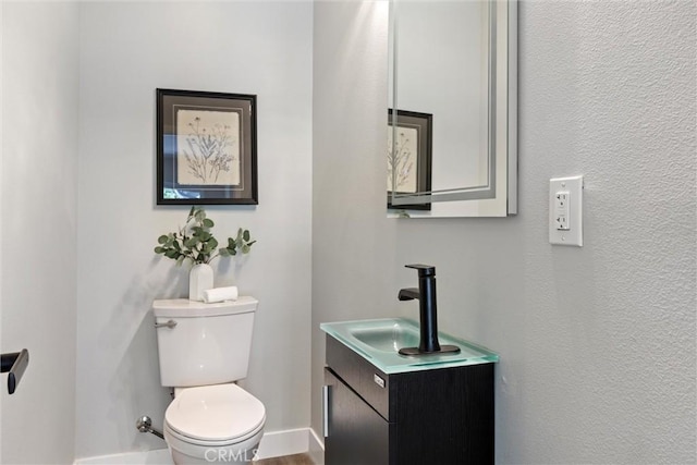 3078 Wilton Dr, Cambria, CA 93428 - half bathroom featuring vanity and toilet