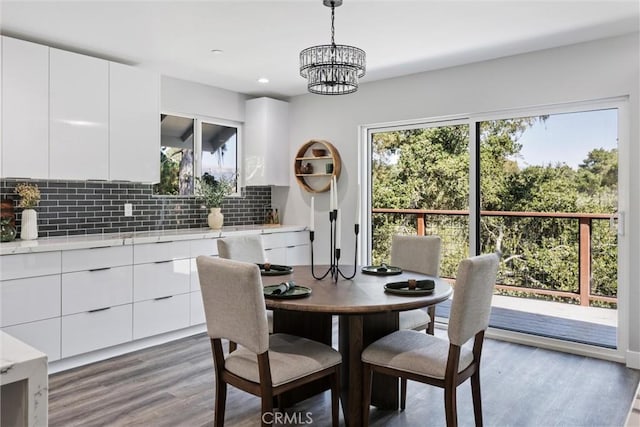 3078 Wilton Dr, Cambria, CA 93428 - dining space with wood finished floors, healthy amount of natural light, a chandelier, and recessed lighting
