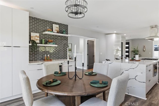3078 Wilton Dr, Cambria, CA 93428 - dining space with wood finished floors, a chandelier, and recessed lighting