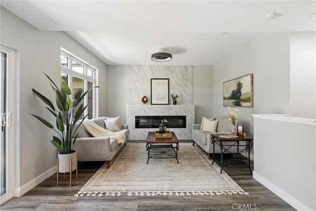 3078 Wilton Dr, Cambria, CA 93428 - living room with wood finished floors and a high end fireplace
