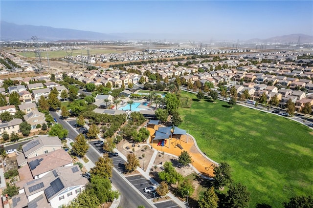 birds eye view of property featuring a mountain view