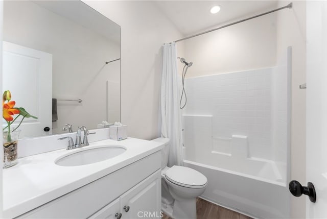 full bathroom with toilet, shower / bathtub combination with curtain, vanity, and wood-type flooring