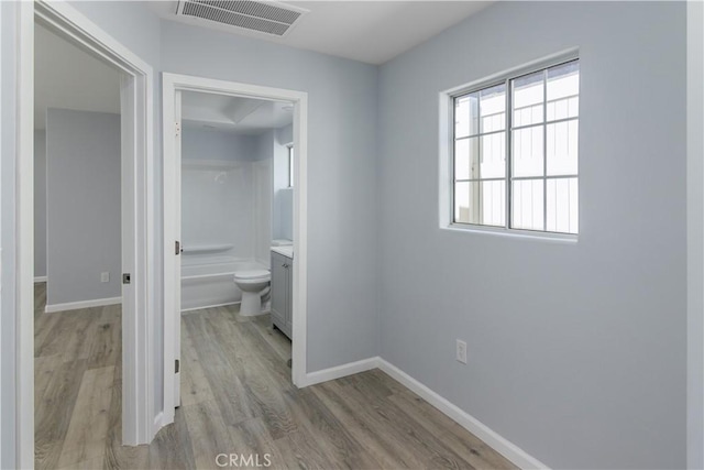 10125 Sharp Ave, Arleta, CA 91331 - hall with light wood-type flooring and baseboards