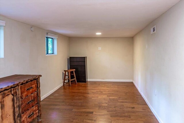 interior space with dark hardwood / wood-style floors