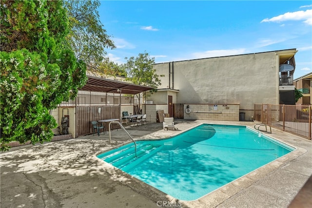 view of pool with a patio