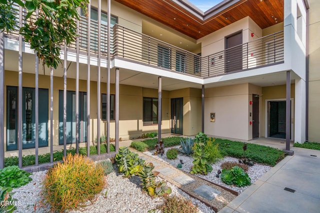 doorway to property with a balcony