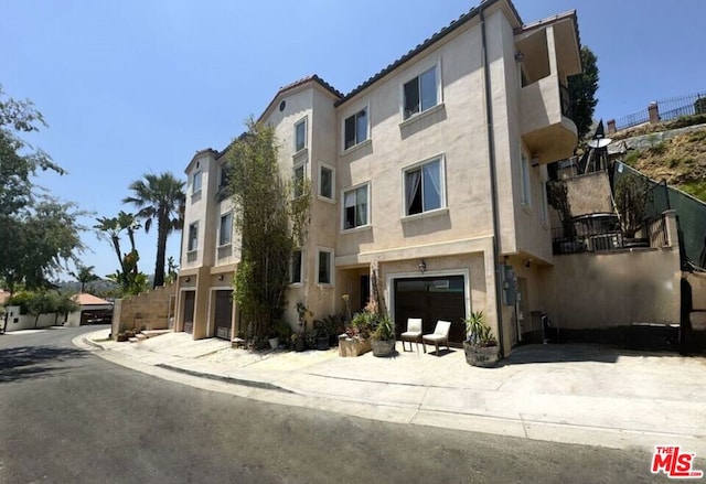 view of property with a garage