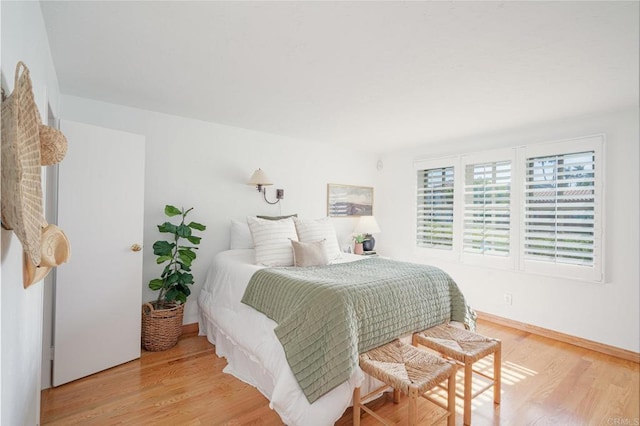 bedroom with light hardwood / wood-style floors