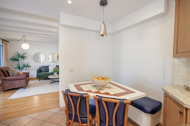 dining room with light tile patterned flooring