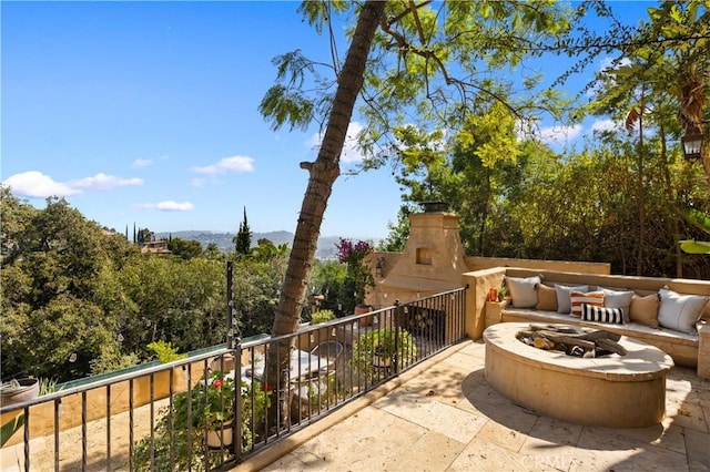 view of patio featuring a fire pit